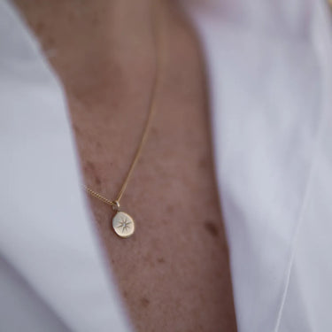 Gold Las mo shlí small diamond pendant